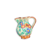 Monaco pourer with floral motifs
