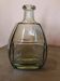 Bouteille ancienne en verre fumé, style art déco