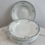 Set of 7 deep plates in earthenware, decorated with a green frieze.
