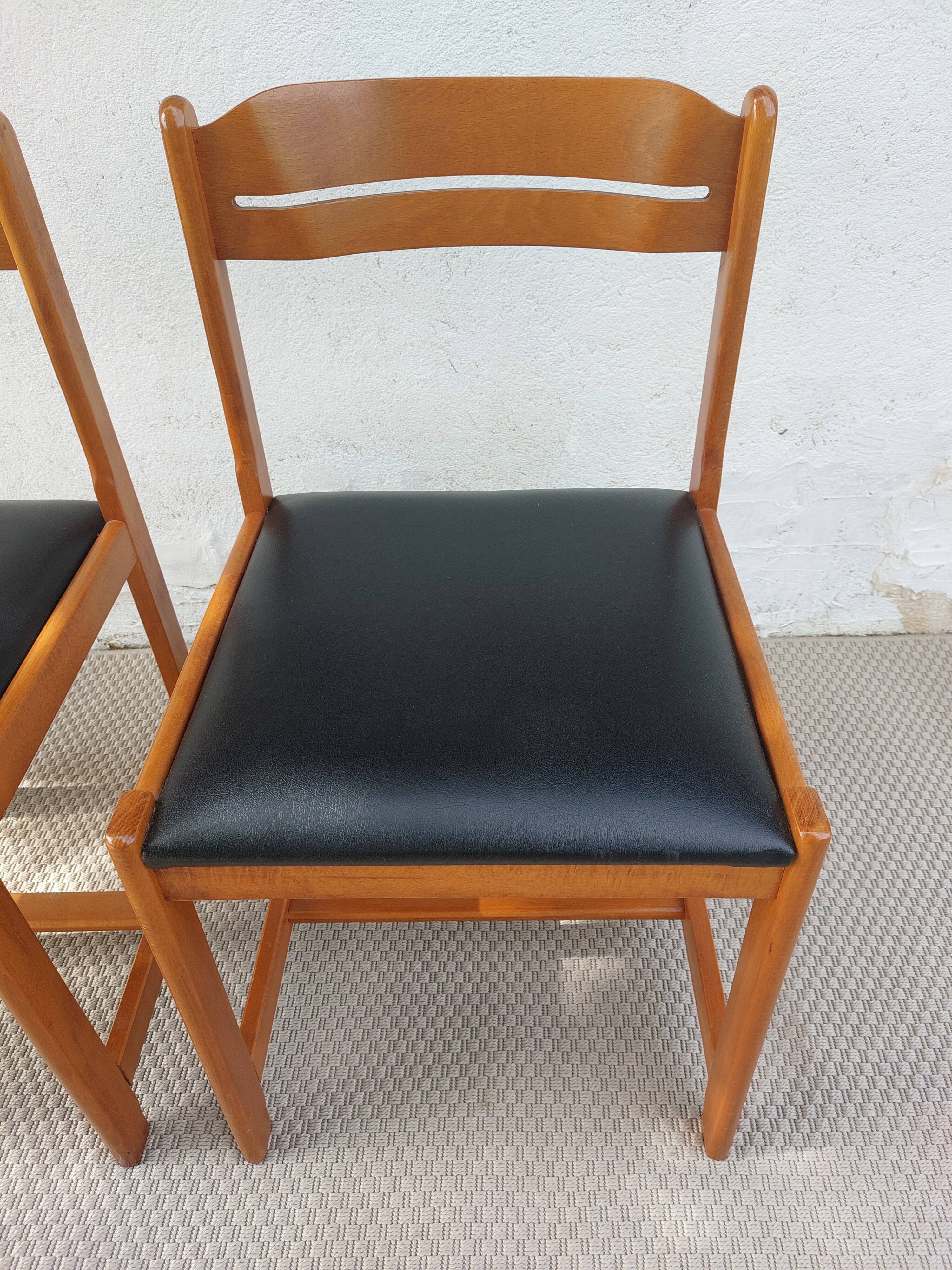 paire de chaises style scandinave, simili cuir noir