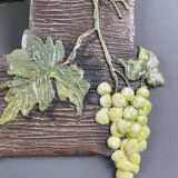 Miroir en bois sculpté à décor de vigne, XXème siècle