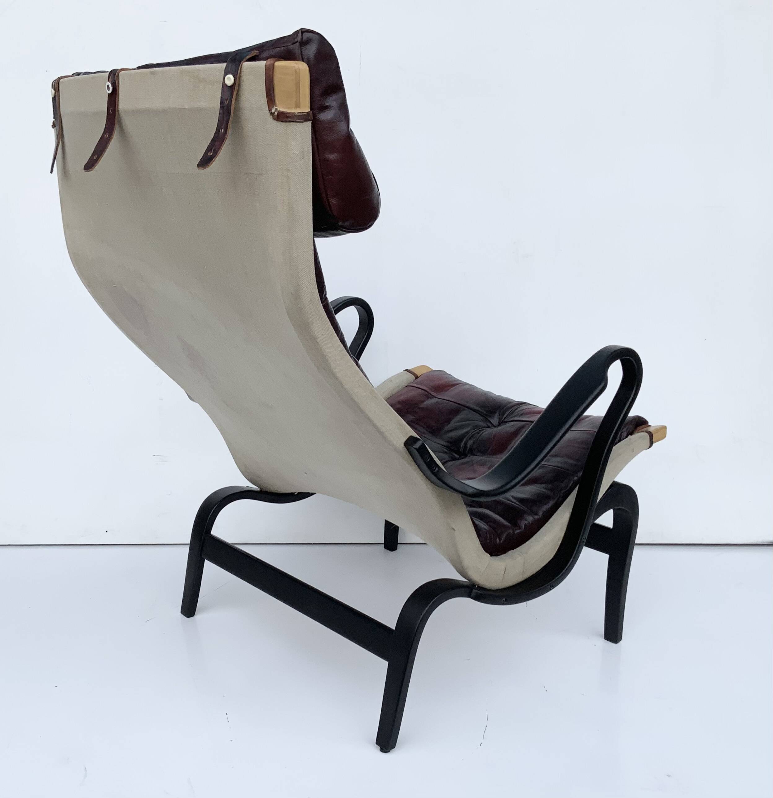 Vintage Pernilla 69 Armchair by Bruno Mathsson for Dux In Oxblood Leather
