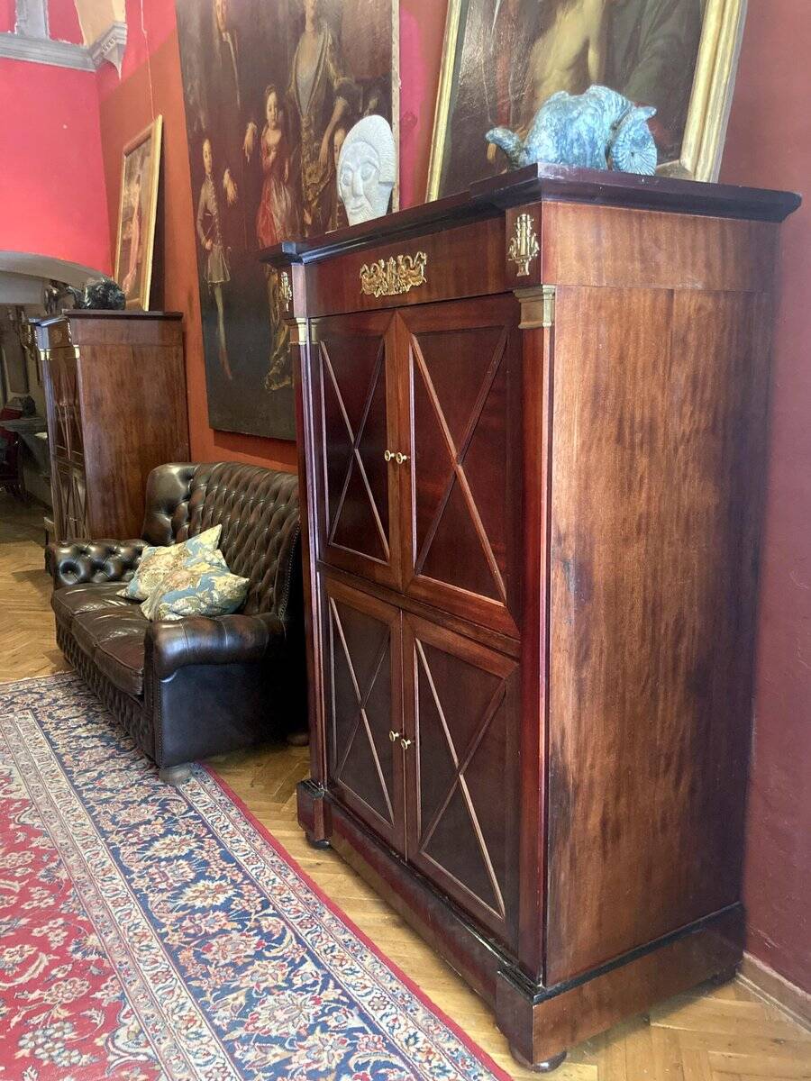 Cabinet, wardrobe or mahogany and ormolu wine bar in French Empire style with four doors.