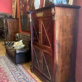 Cabinet, wardrobe or mahogany and ormolu wine bar in French Empire style with four doors.