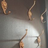 Set of 5 antique "Lion Head" coat hooks.