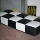 Roche Bobois black and white checkered leather bench, low bench.