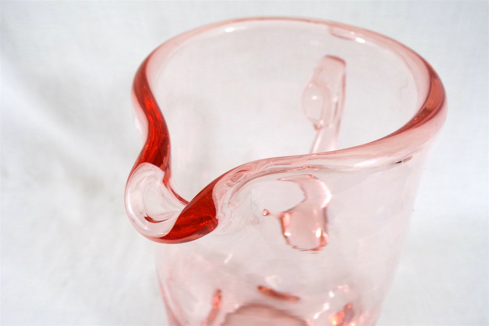 Antique pitcher made of blown glass