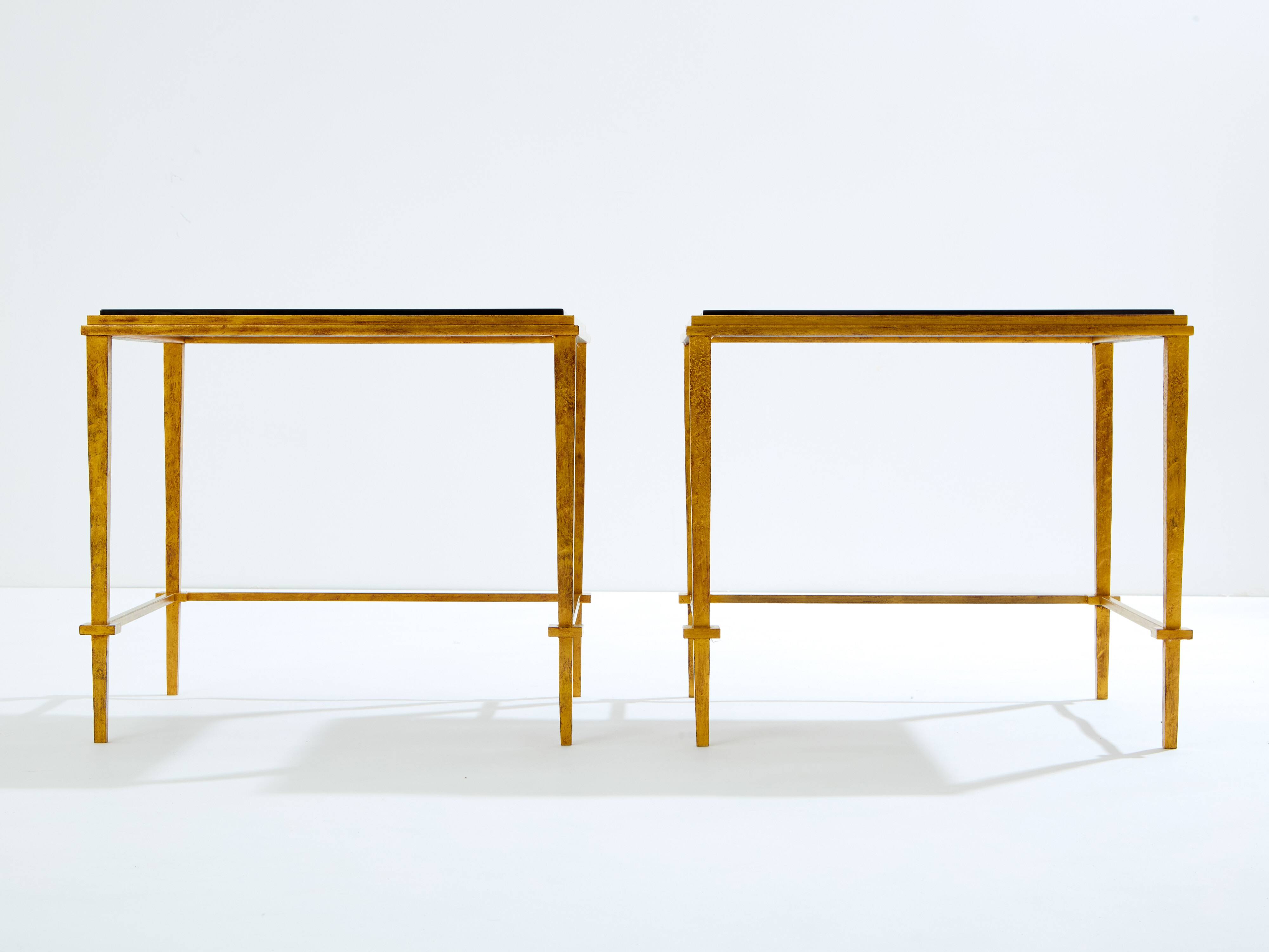 Pair of side tables in gilded iron and black lacquer Maison Ramsay 1950