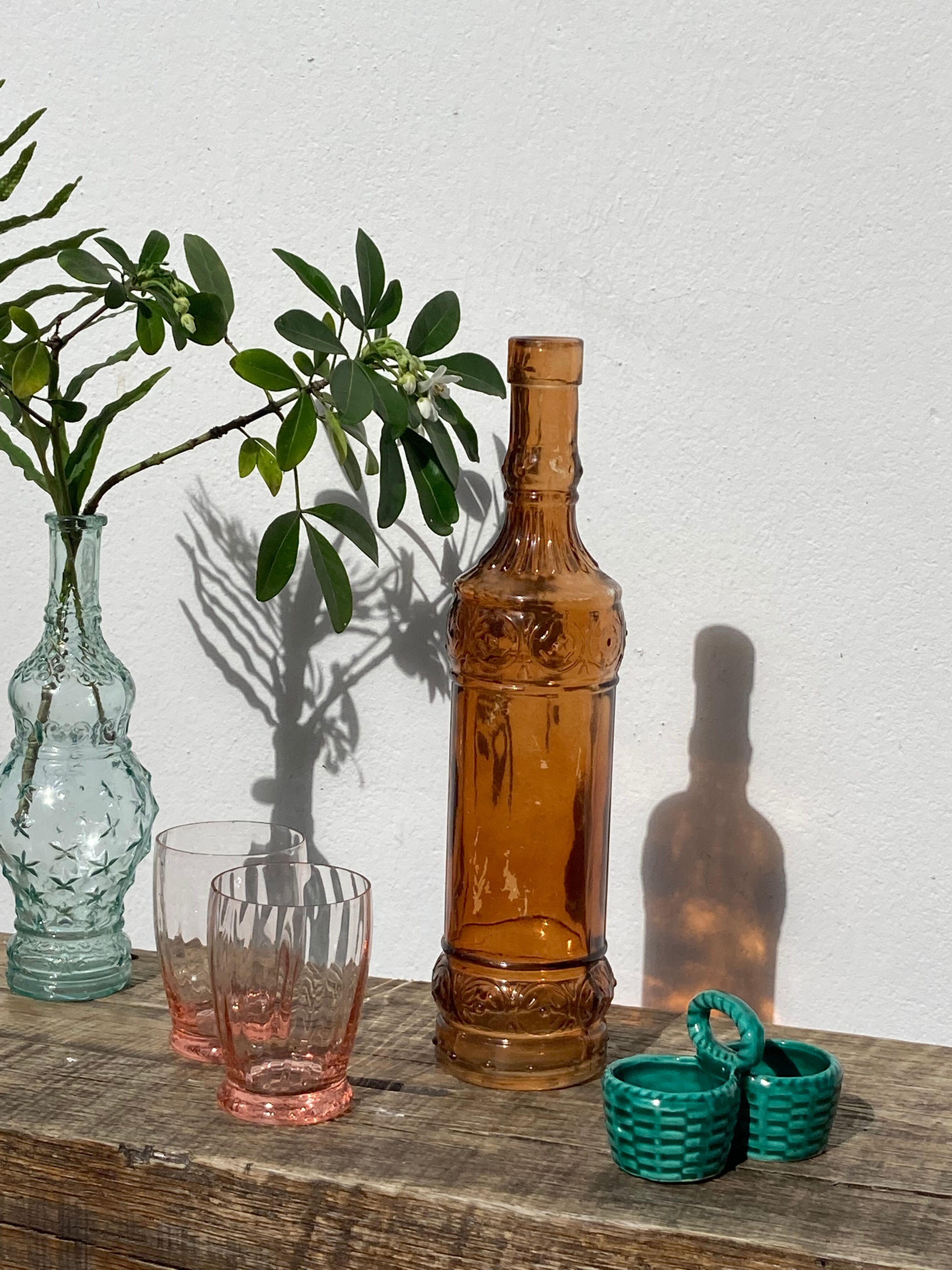 Vintage amber bottle in patterned brown glass