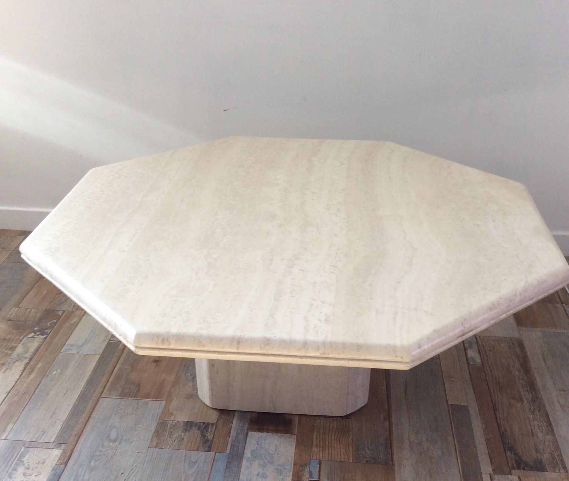 Octagonal coffee table in travertine