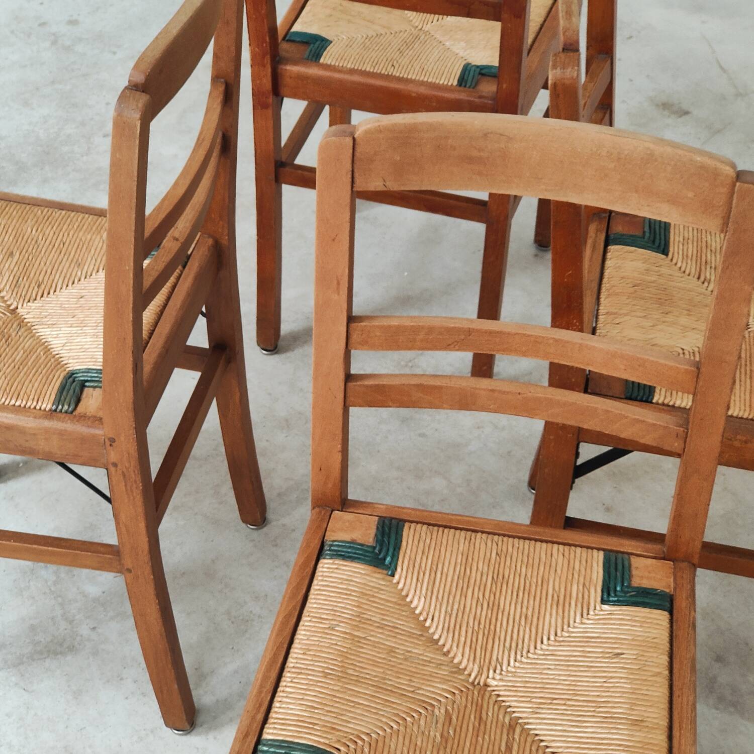 Set of 4 designer oak and straw chairs from the 1950s