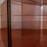 Vintage trio of nesting tables in smoked plexiglass by Michel Dumas, year.