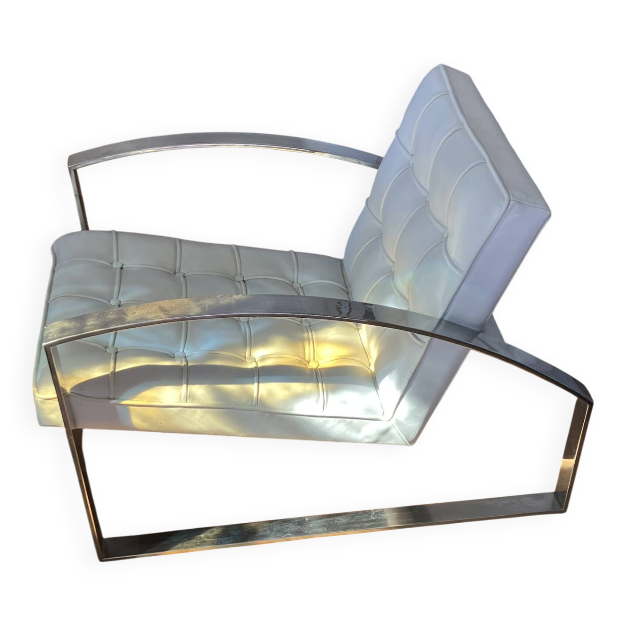 Meridiani armchair — italian design, chrome steel and tufted white leather.