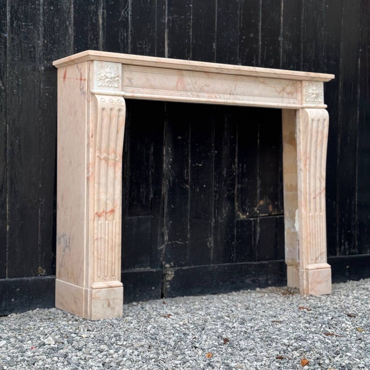 Louis XVI style fireplace in pink marble, circa 1920