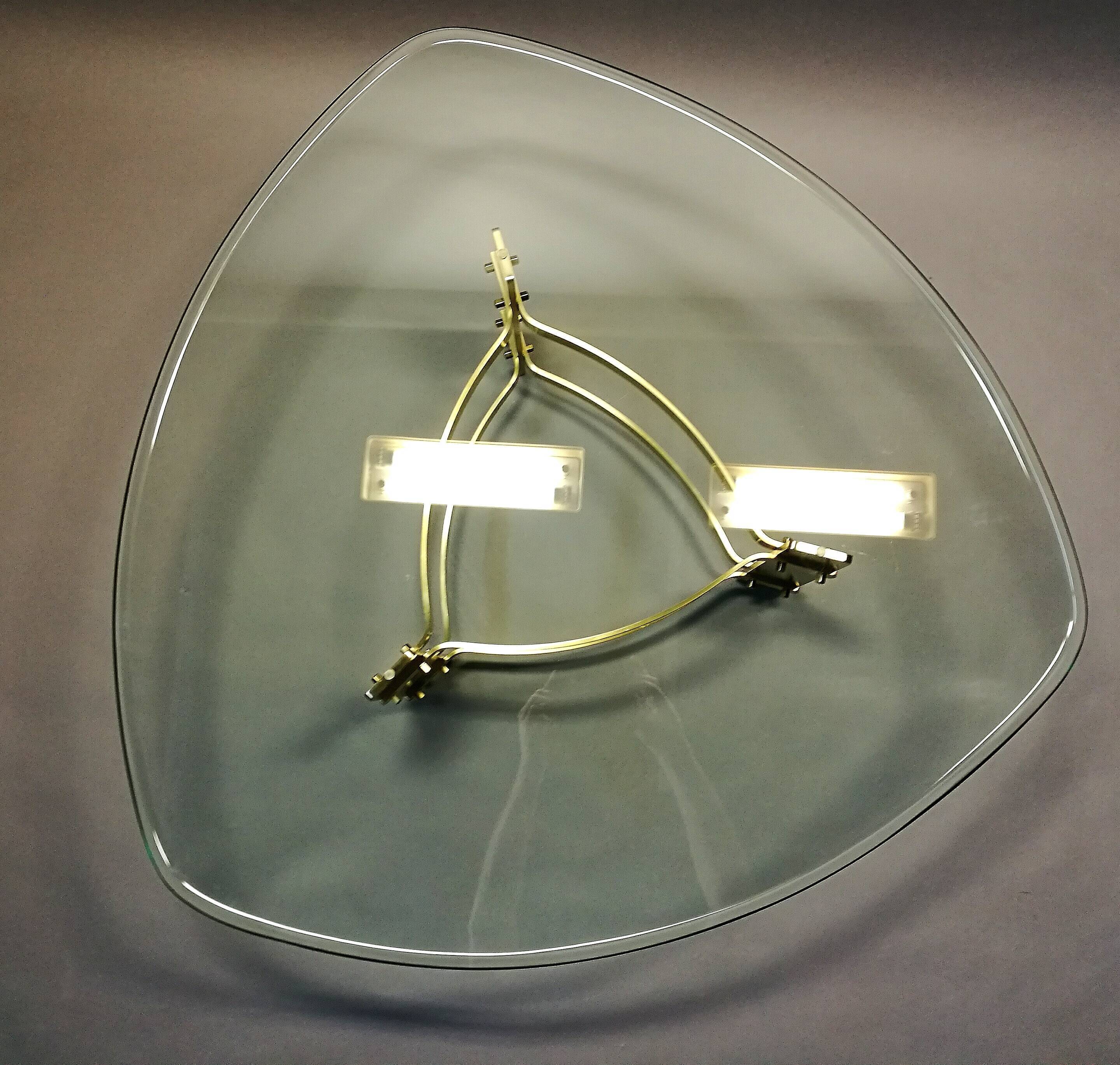 Coffee table  70s form free brass and glass