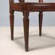 Antique walnut armchair with caned seat, Italy, 18th century