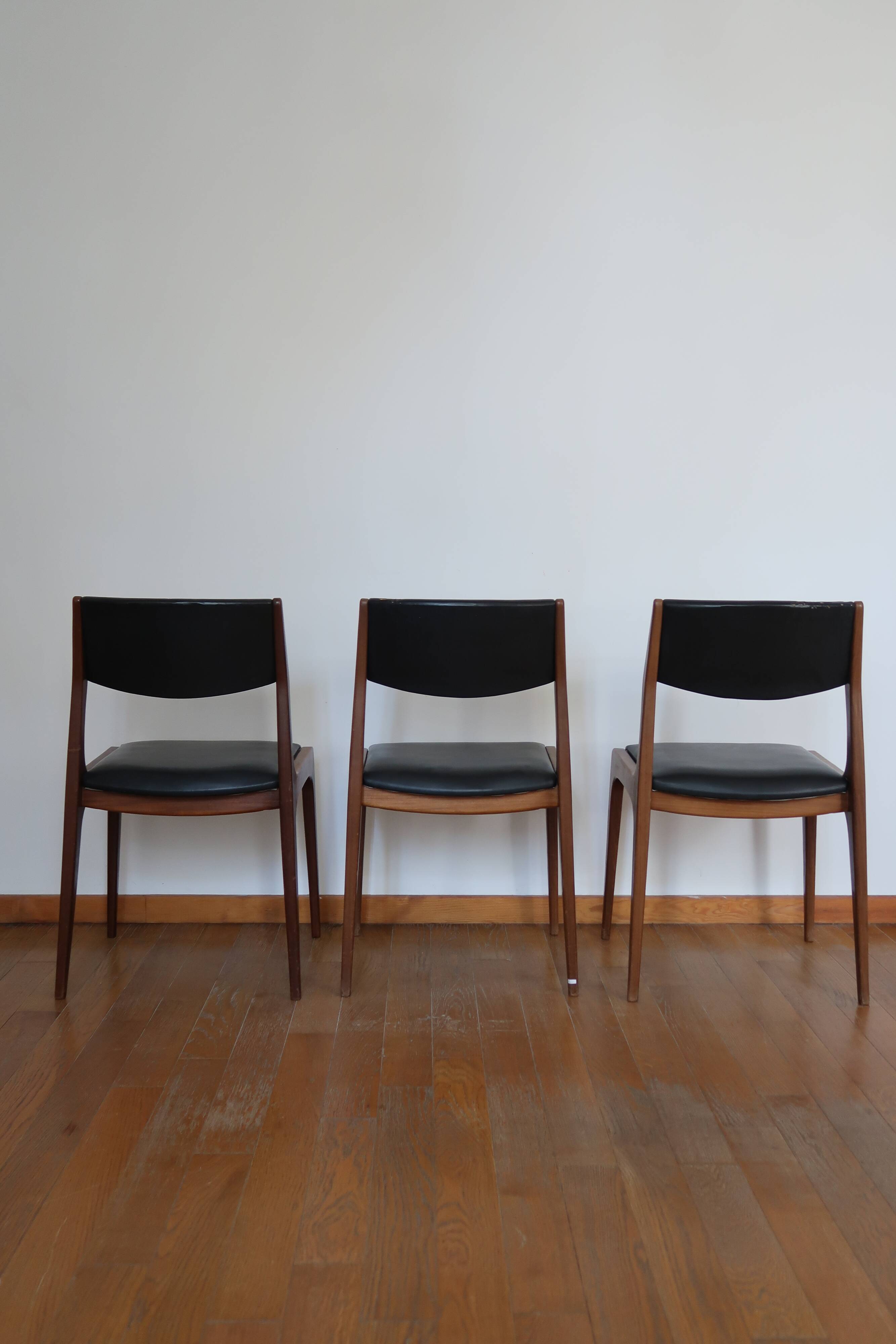 Series of 3 Scandinavian teak and skai chairs