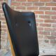 Chair 50 years in wood and faux black leather cocktail