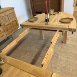 Oval farmhouse table in solid oak with extensions.