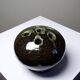 Brown and green glazed stoneware flower holder, vintage craftsmanship from the 1970s-1980s.