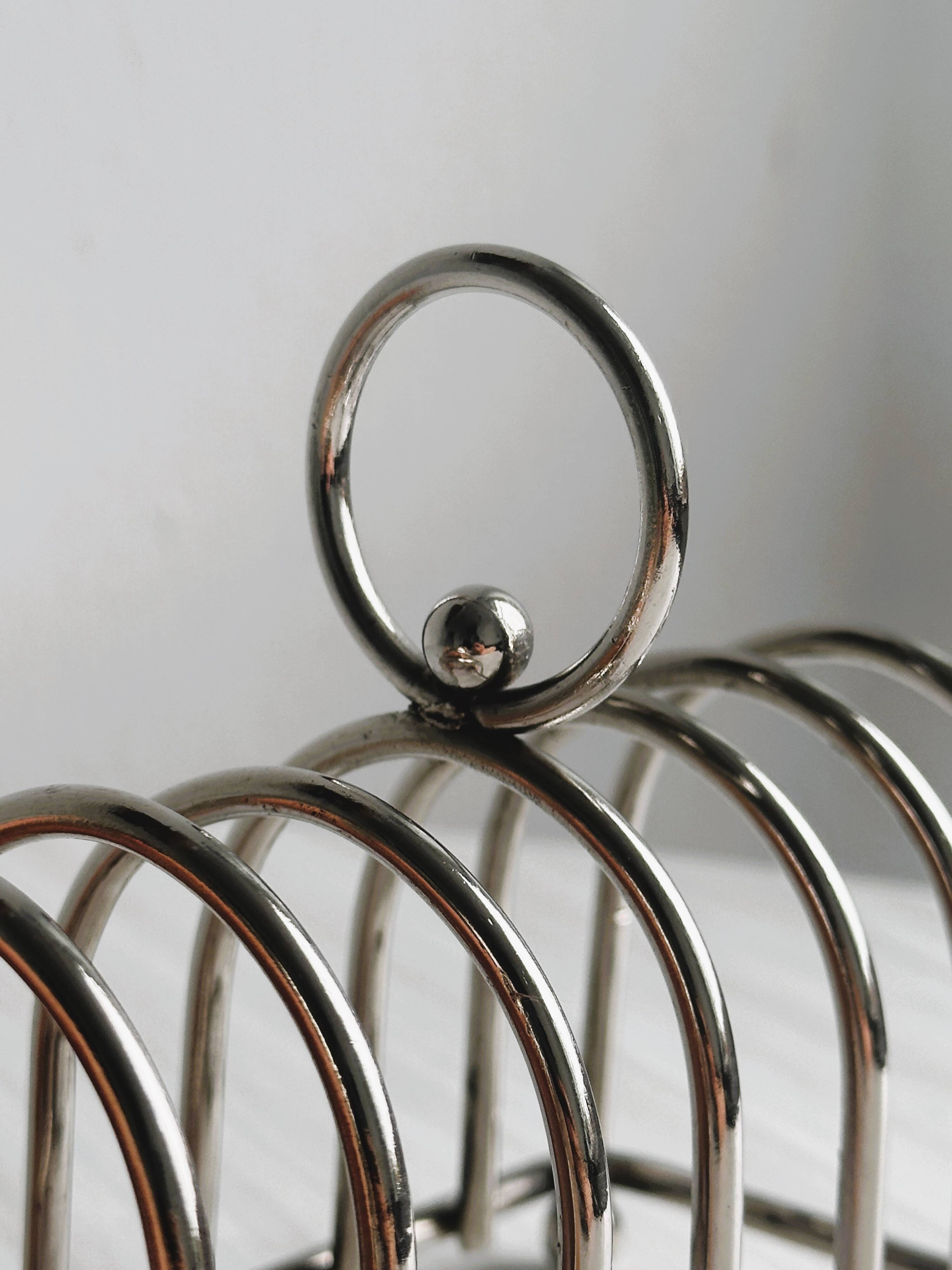 Stainless steel toast rack.