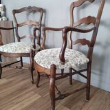 Pair of Provencal armchairs in brown wood and floral fabric