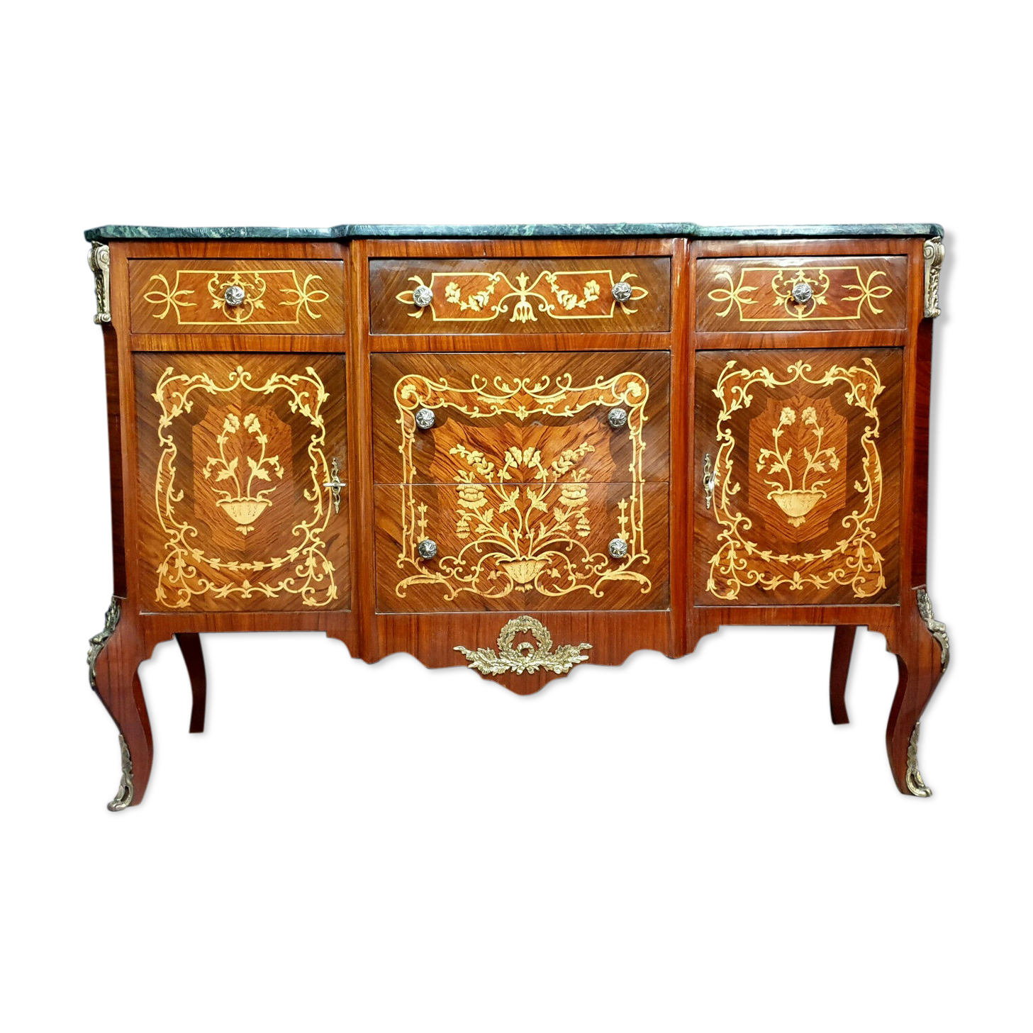 Commode Louis XV en marquèterie de bois précieux