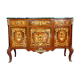 Commode Louis XV en marquèterie de bois précieux