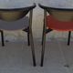 4 Gondola-style chairs with a sturdy metal frame and faux leather for