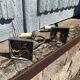 Two lion head wall sconces in tin.