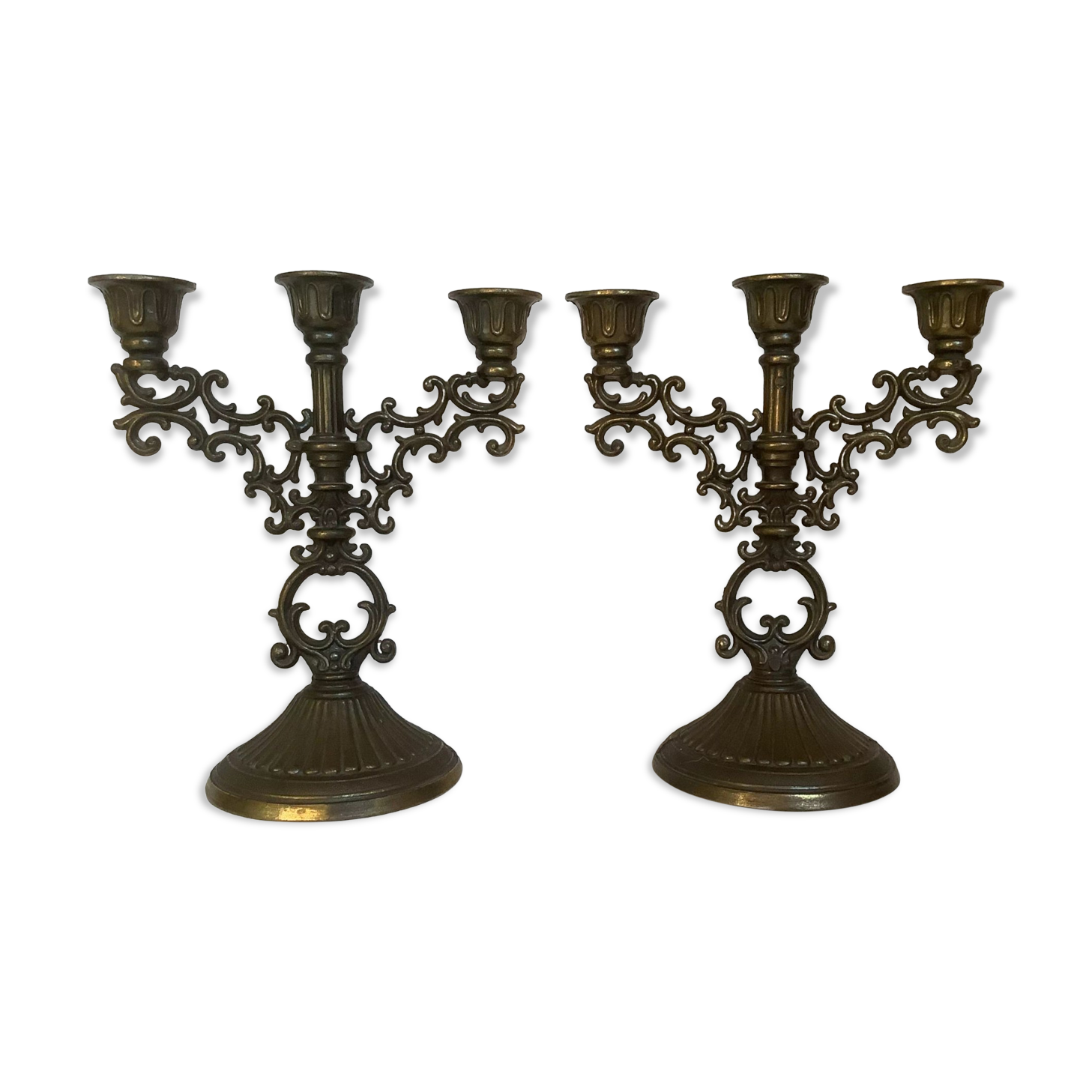 Pair of baroque brass candle holders