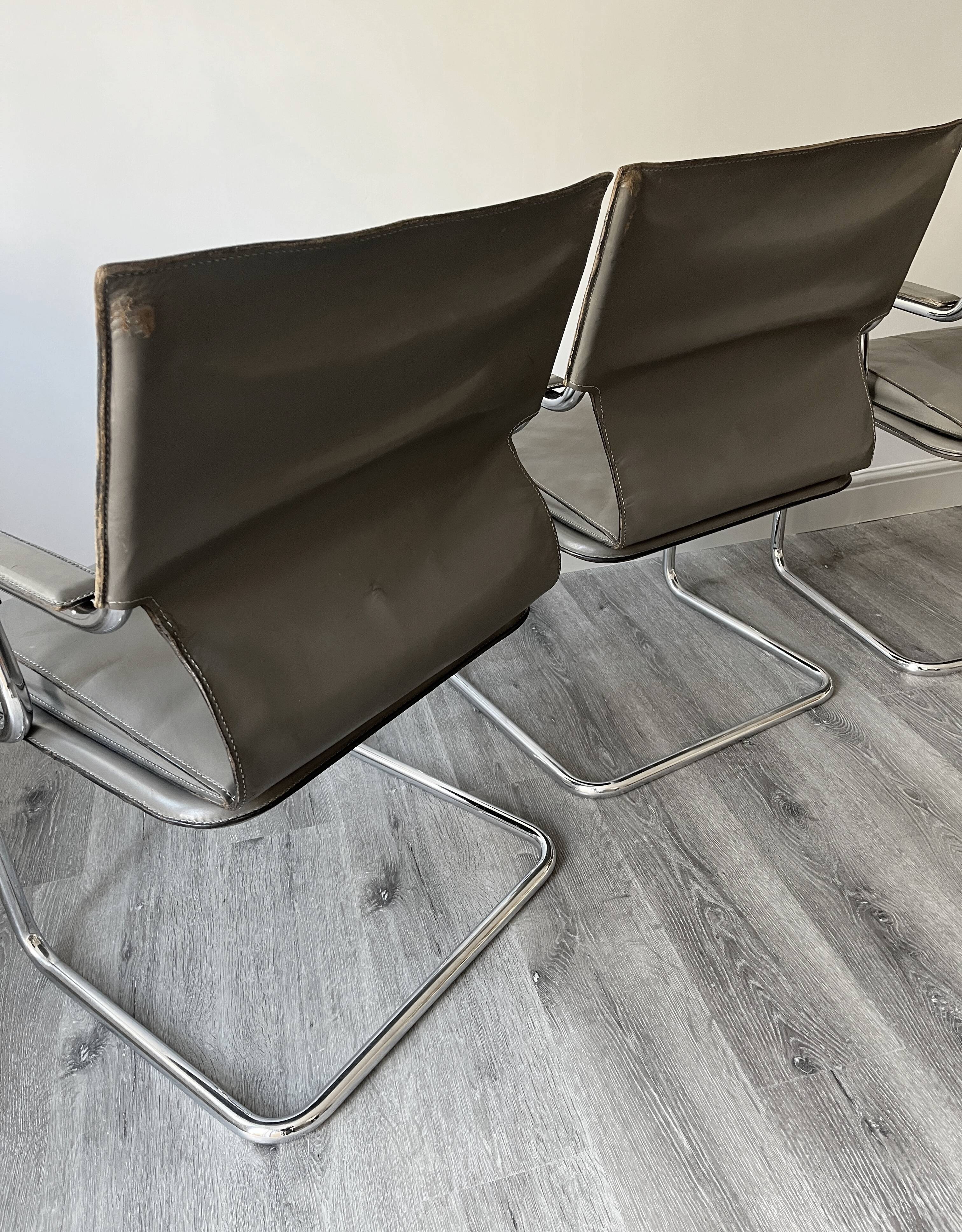 Set of 6 Uno chairs in grey leather on tubular chrome cantilevered frames