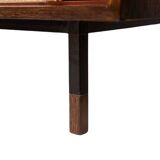 Sideboard in wenge, raffia and lacquered metal. 1970s.