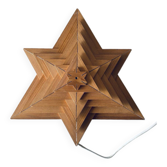 Luminous wooden wall star