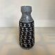 Vase made of matte and glazed ceramic.