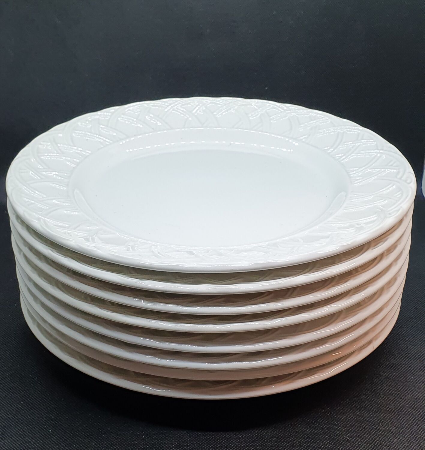8 white ceramic plates