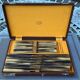 Box of 12 table knives and 12 vintage cheese knives