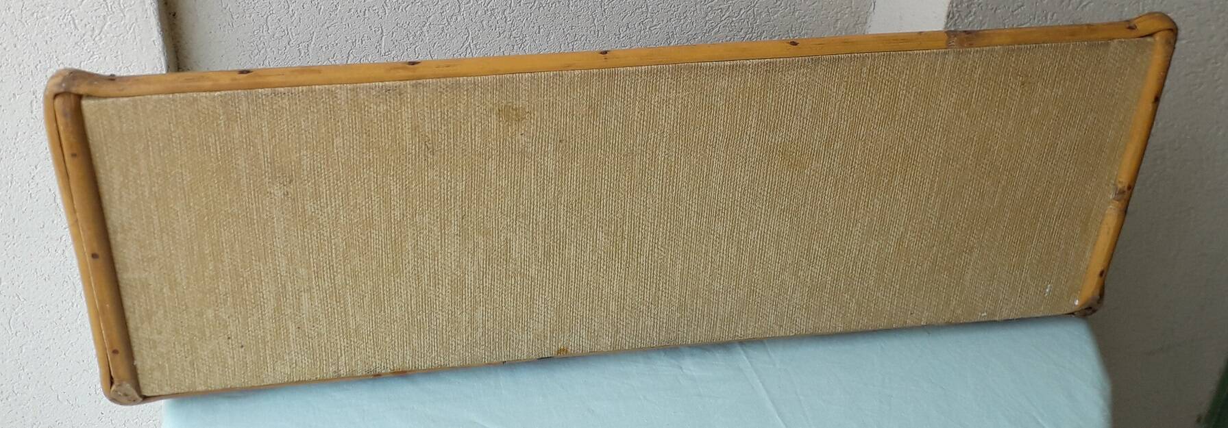 Wall shelf in rattan