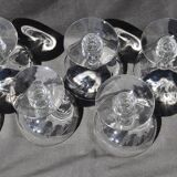 9 old champagne glasses in flat-waisted blown glass