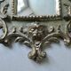 Mirror with cherub head in gilded wood, Venetian baroque style