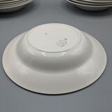 12 hollow porcelain plates, floral decoration and golden ledé - ∅: 23cm