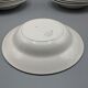 12 assiettes creuses, décor floral et liseré doré - ∅ : 23cm