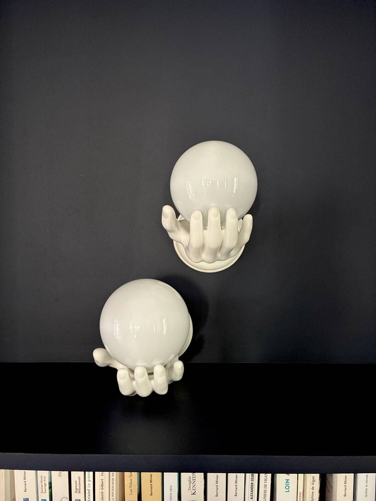 Pair of Pop Art "Globes on hands" ceramic wall lights - 1980.