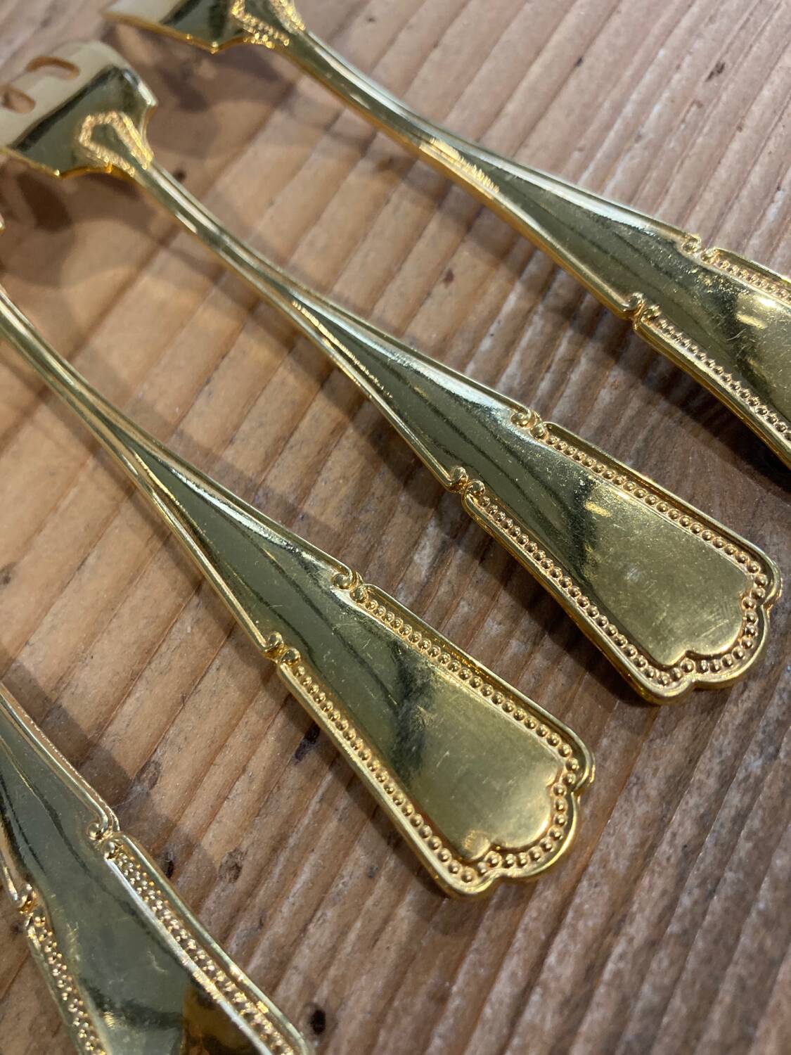 Set of 6 golden dessert forks