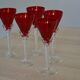 5 red crystal glasses with twisted stems