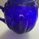Vintage cobalt blue glass pitcher by Henry Dean