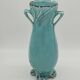 Art Deco turquoise vase with a deer design