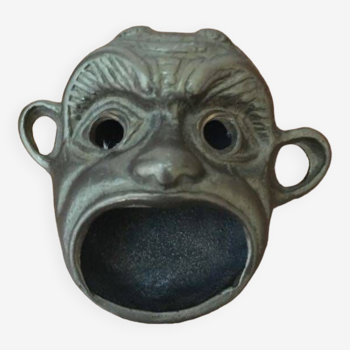 Old bronze ashtray "Face of the devil"