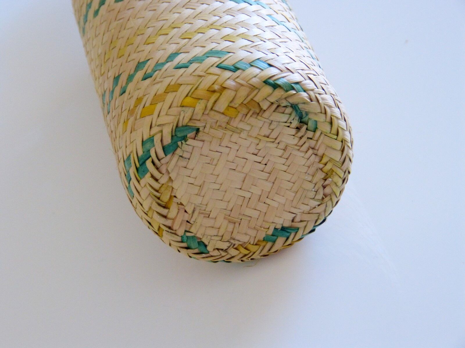 Glass and wicker bottle