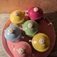 6 small porcelain cream pots from Limoges with a tray.